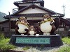 タヌキの里向島像